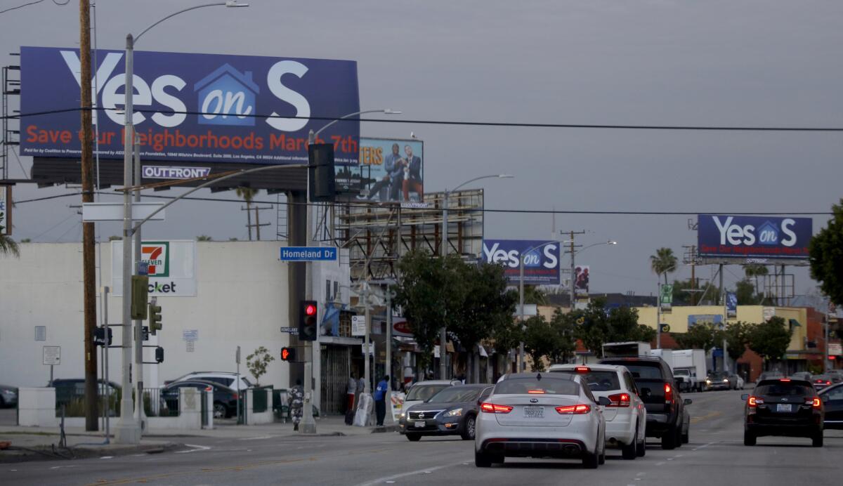"Vote Yes on Measure S" billboards along Crenshaw Boulevard.