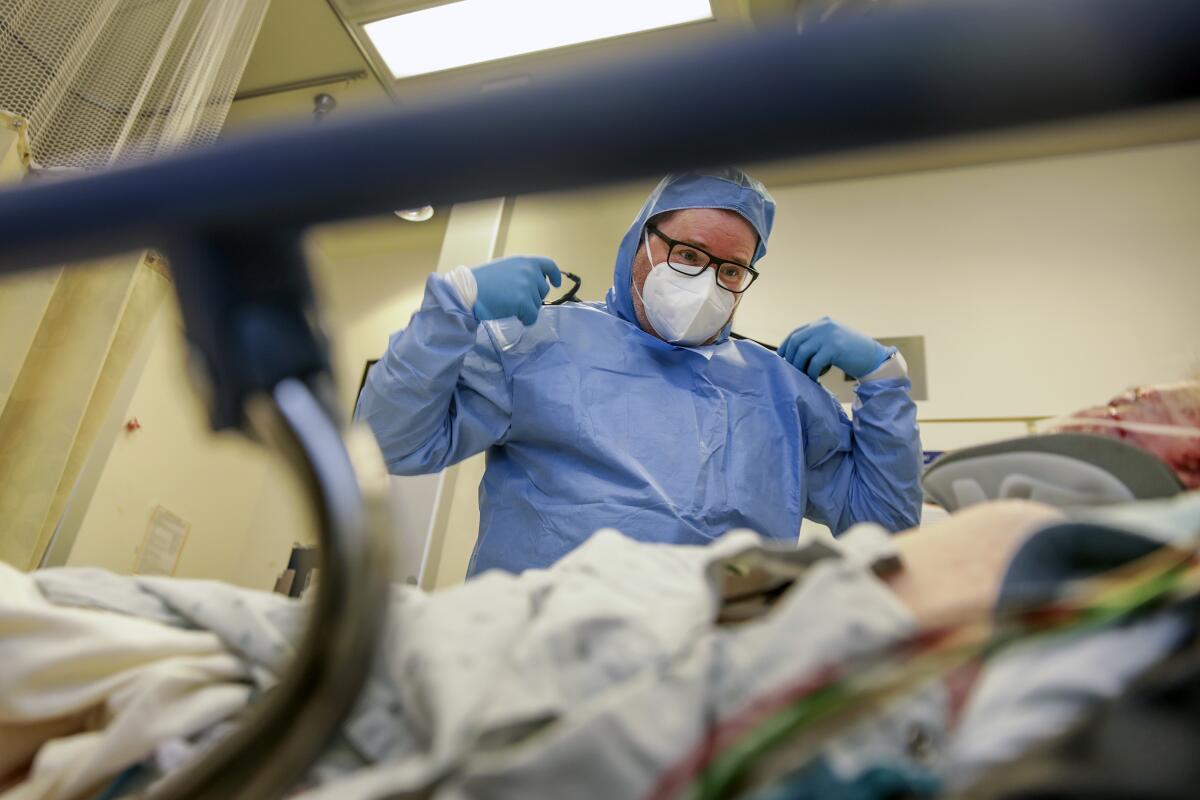 A doctor attends to a patient brought into emergency unit at the hospital. 