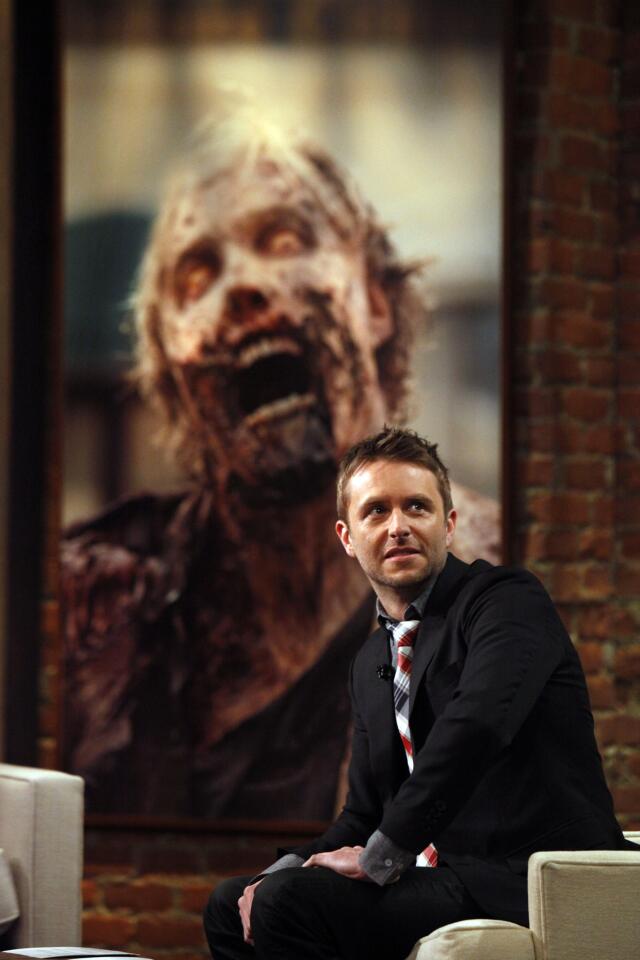 Chris Hardwick hosts "The Talking Dead," the "Walking Dead" offshoot that has turned into a surprise hit for AMC. Hardwick juggles audience questions and tweets and interacts with guests who are all fanatical about the series.