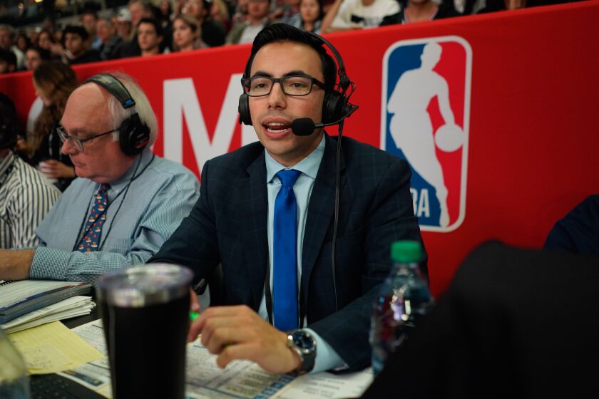 LOS ANGELES, CALIF. - NOVEMBER 03: Noah Eagle, 22, the radio voice of the LA Clippers, gives a play by play during the third quarter of a NBA game between the Utah Jazz and the LA Clippers at Staples Center on Sunday, Nov. 3, 2019 in Los Angeles, Calif. (Kent Nishimura / Los Angeles Times)