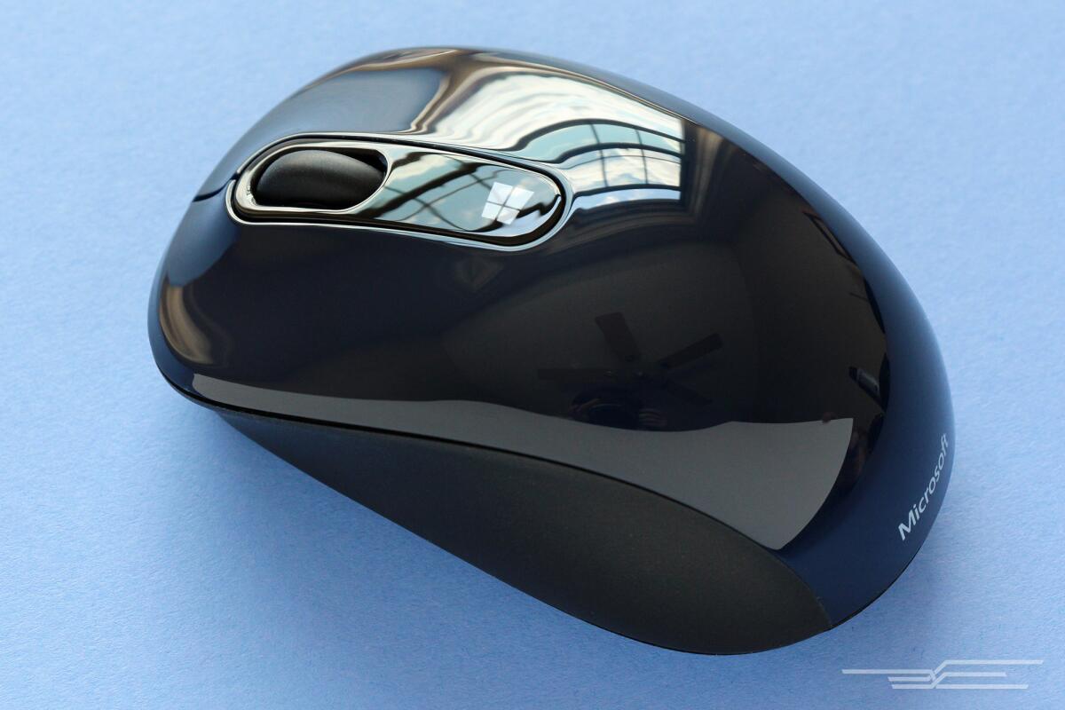 The Microsoft Sculpt Mobile is a compact, travel-sized mouse that doesn't lack palm support. (Wirecutter)