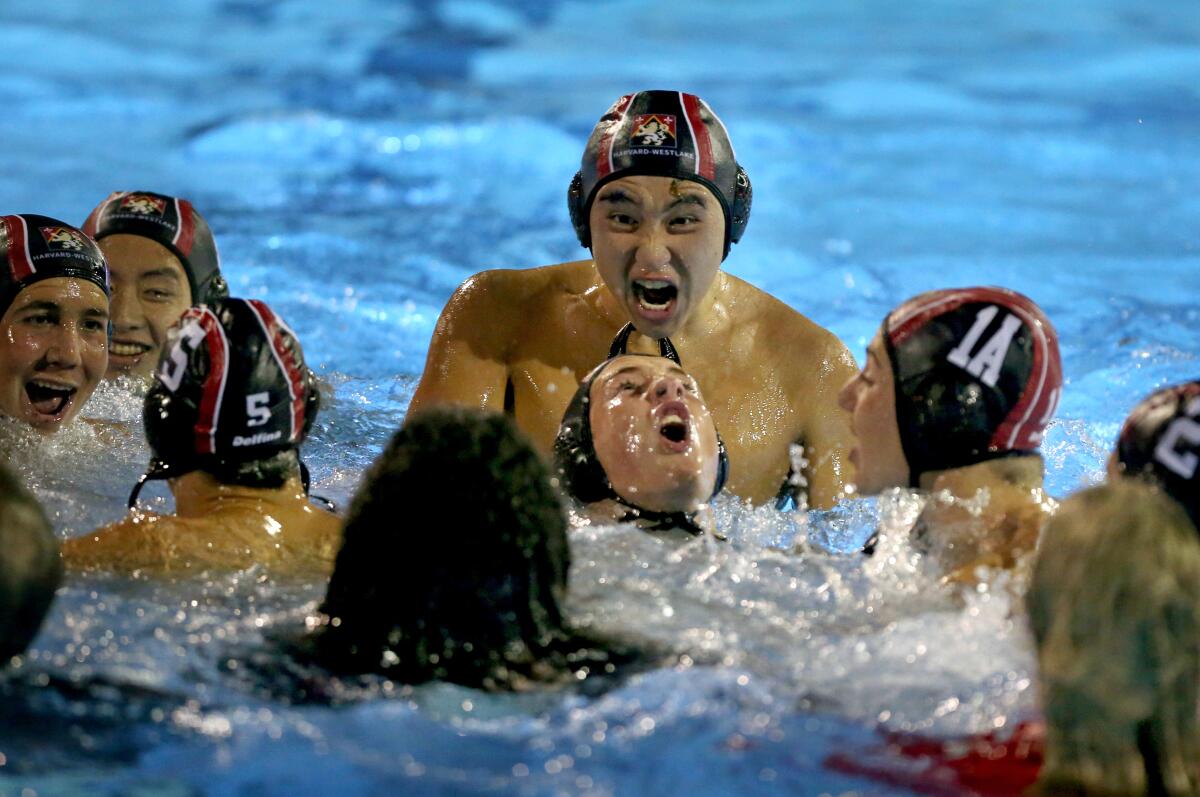 Harvard-Westlake celebrates a 6-4 victory over Newport Harbor in the CIF Southern Section Division 1 title match on Saturday at Woollett Aquatics Center in Irvine.