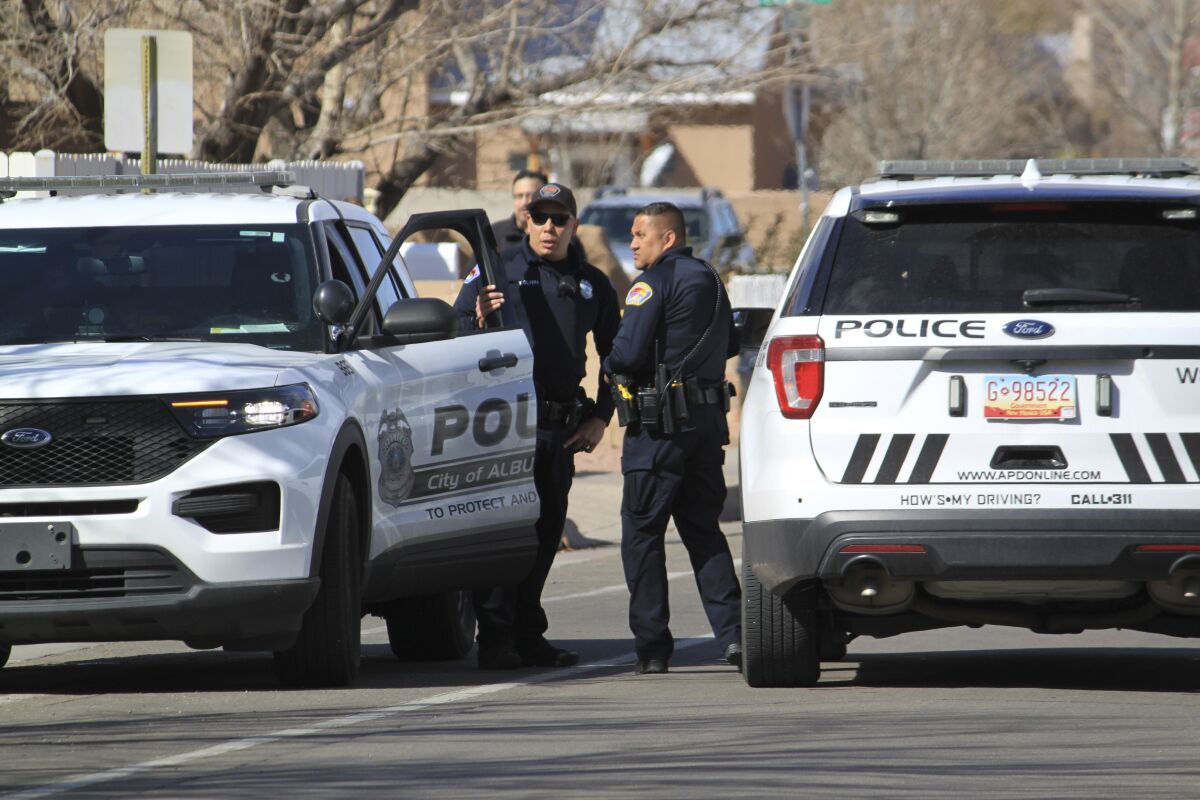 Police outside a home of a fatal shooting in Albuquerque