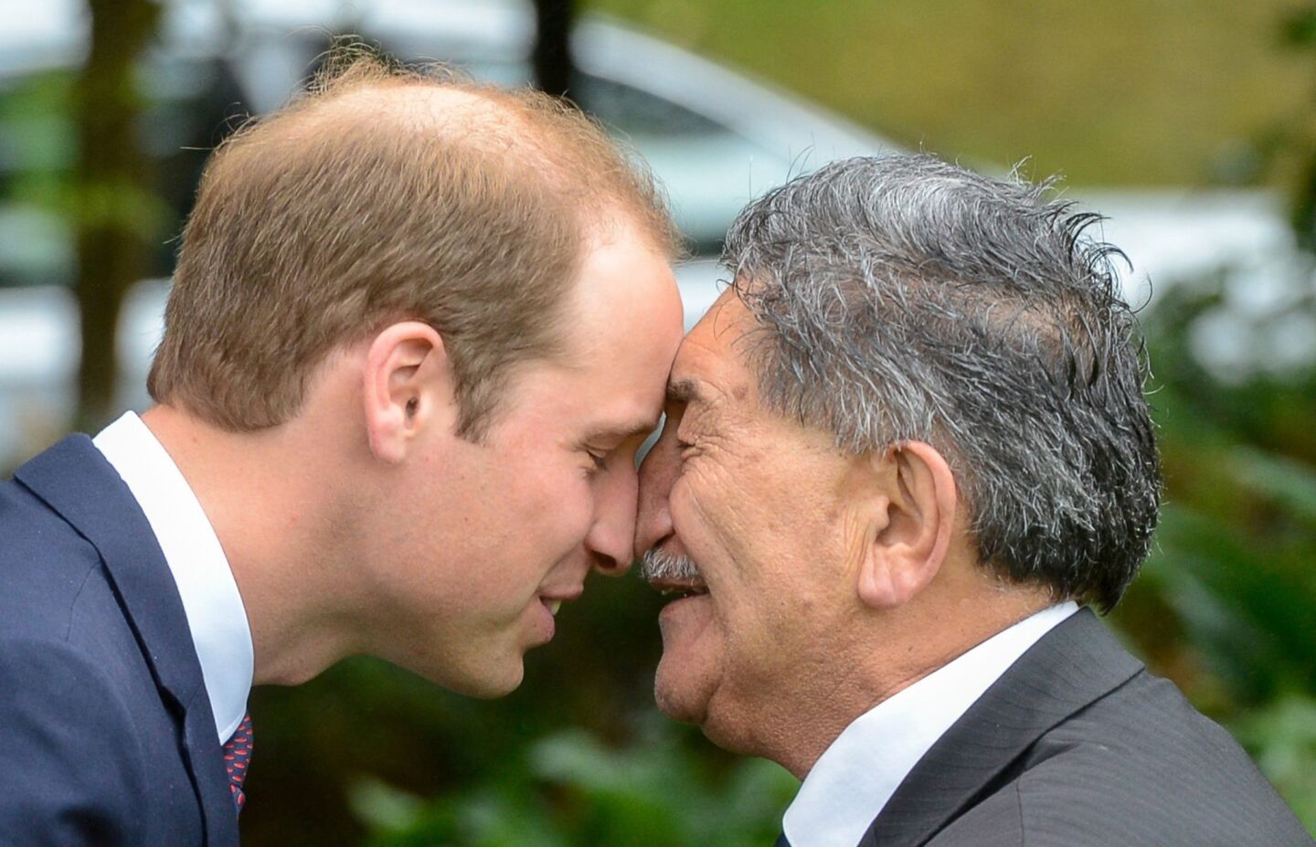 Britain's Prince William receives a hongi, a traditional Maori greeting, from Maori elder Lewis Moera.