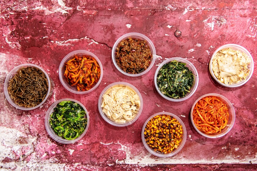 A spread of banchan from Shiku.