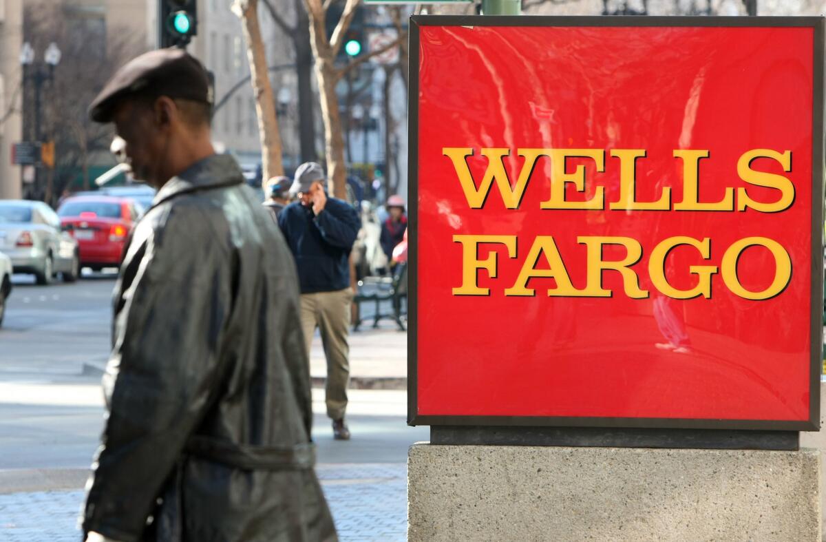 Prudential has suspended sales of insurance policies through Wells Fargo after a lawsuit alleged that bank workers sold policies to customers who did not want them.