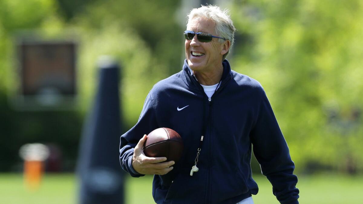 Seahawks Coach Pete Carroll is all smiles during a rookie camp on May 8.