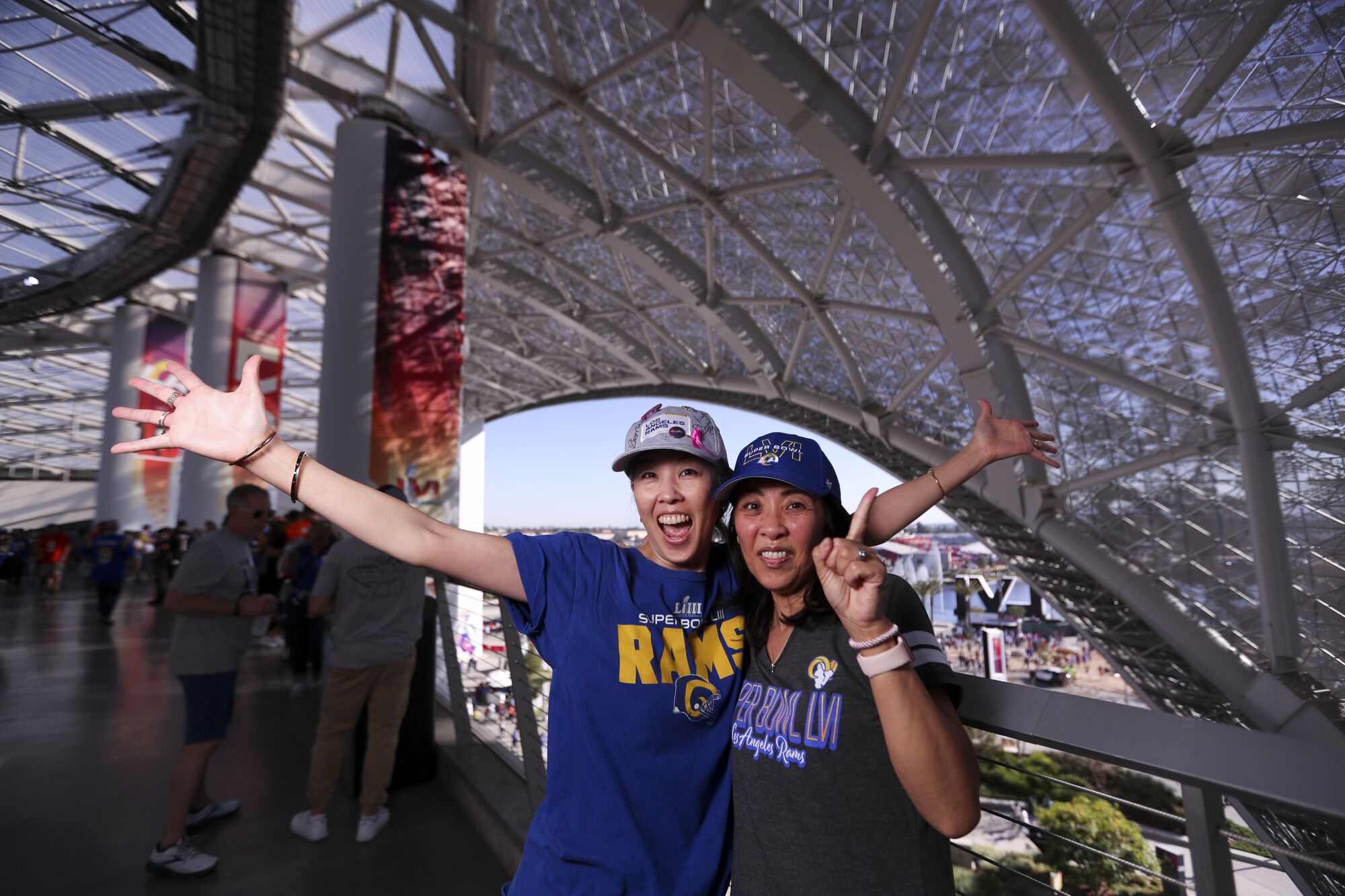 Dana Wakamoto, of Tustin, poses for a photo with Lorraine Shimahara, of Santa Monica, before Super Bowl LVI