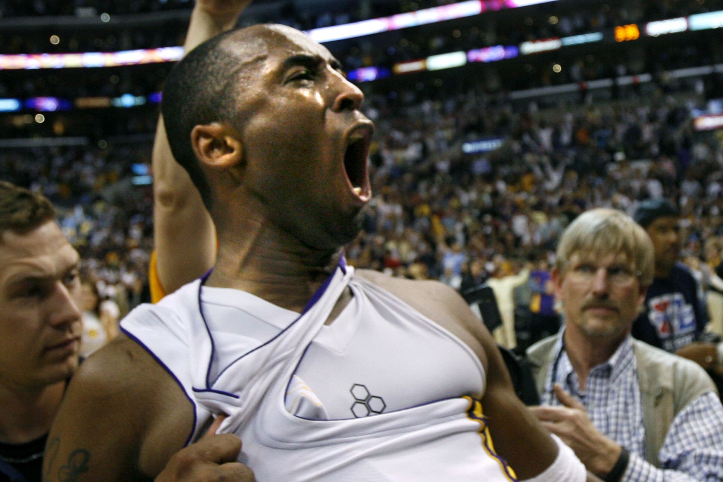 Kobe Bryant reacts after making the winning shot against the Phoenix Suns in Game 4 of a 2006 first-round playoff series at Staples Center.