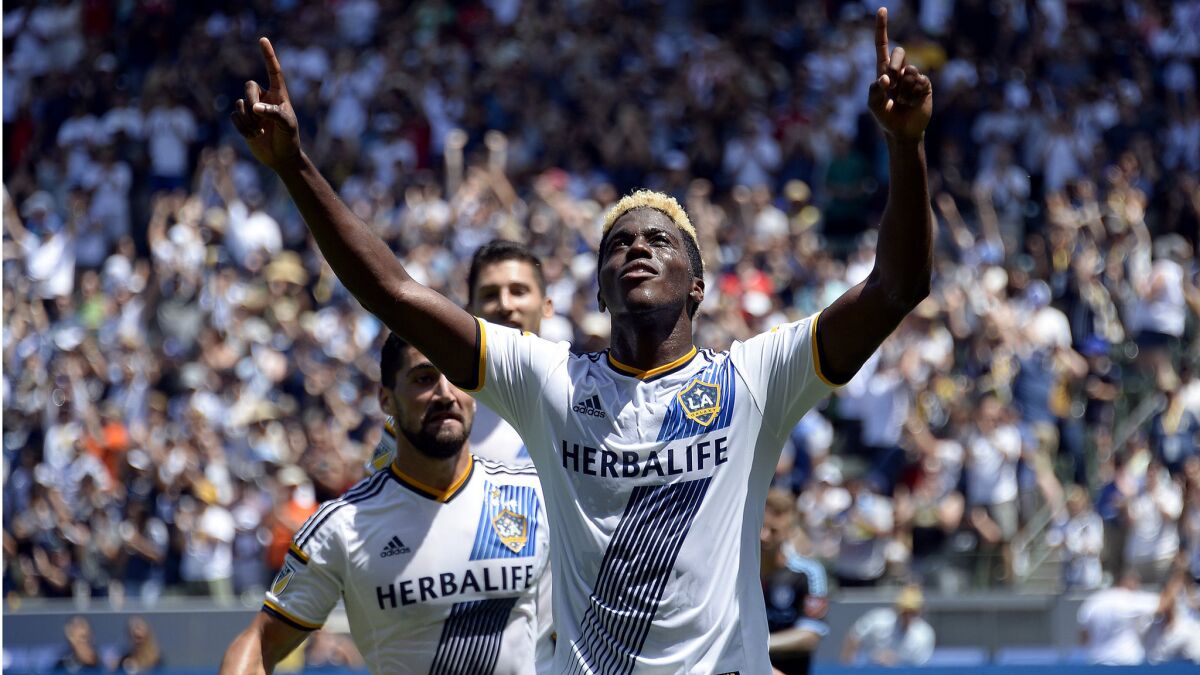 Galaxy midfielder Gyasi Zardes celebrates after scoring a goal against New York City FC in the first half of their MLS game on Sunday at StubHub Center.