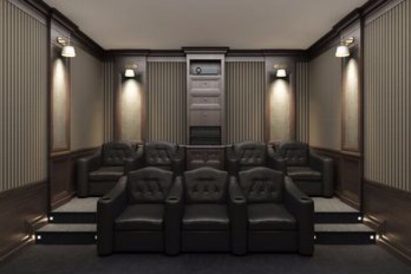 Interior of luxury home theater whith lounge chairs