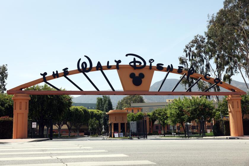 LOS ANGELES, CA - JUNE 02: The entrance to Walt Disney Co. is seen from West Alameda Ave. in Burbank on Wednesday, June 2, 2021 in Los Angeles, CA. This is their corporate headquarters building. (Dania Maxwell / Los Angeles Times)