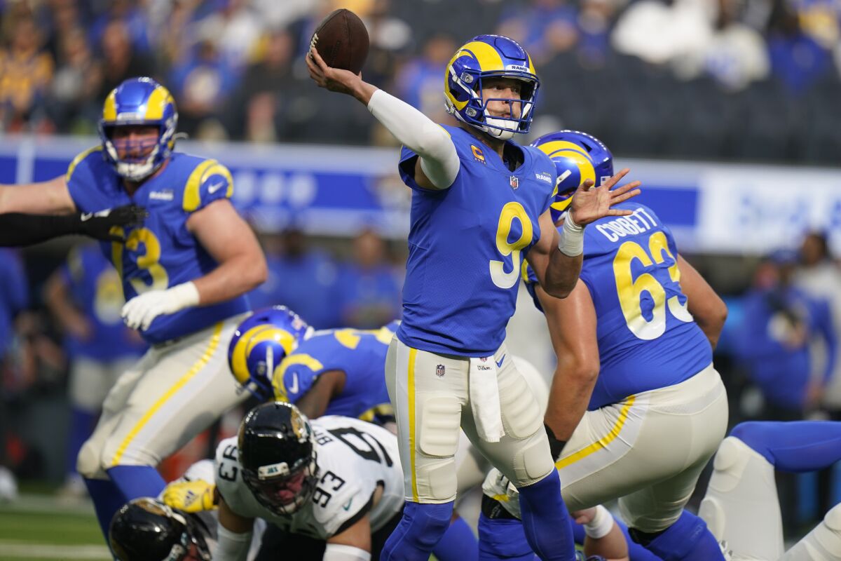 Rams quarterback Matthew Stafford throws during the first quarter.