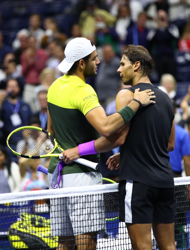 Rafael Nadal, right, shakes hands at the net after his straight sets victory in his Men's Singles semifinal match against Matteo Berrettini inside the Billie Jean King National Tennis Center on Sept. 6, 2019, in Queens.