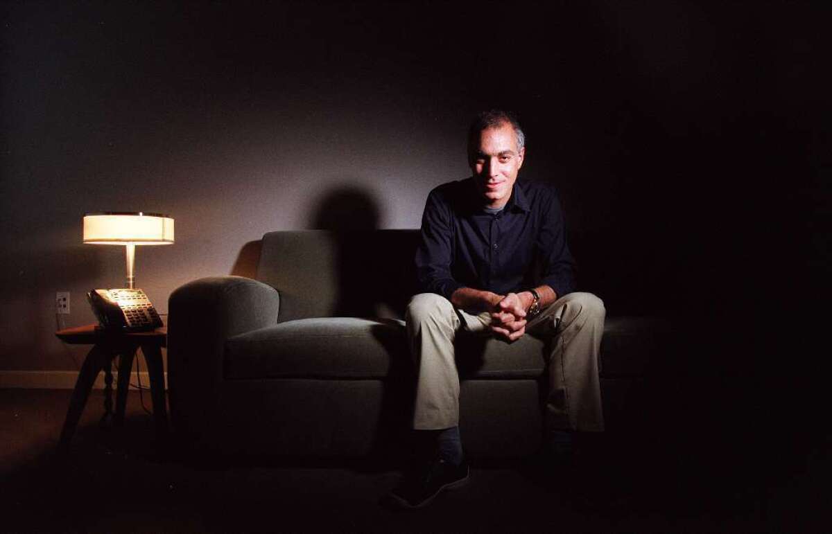 Julio Caro is pictured in 2001. The independent film producer was charged with embezzling $1.5 million from Ron Burkle's Los Angeles investment fund.