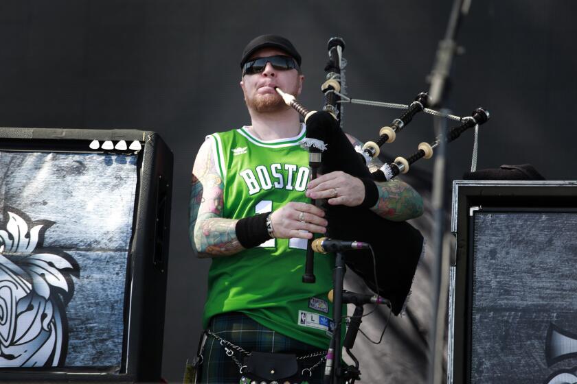 Josh Wallace, of the Dropkick Murphys sported a Boston Celtic jersey while playing his bagpipes on the Coachella Stage.