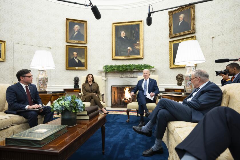 President Joe Biden speaks during a meeting with Congressional leaders in the Oval Office of the White House, Tuesday, Feb. 27, 2024, in Washington. From left, Speaker of the House Mike Johnson of La., Vice President Kamala Harris, Biden, and Senate Majority Leader Sen. Chuck Schumer of N.Y. (AP Photo/Evan Vucci)