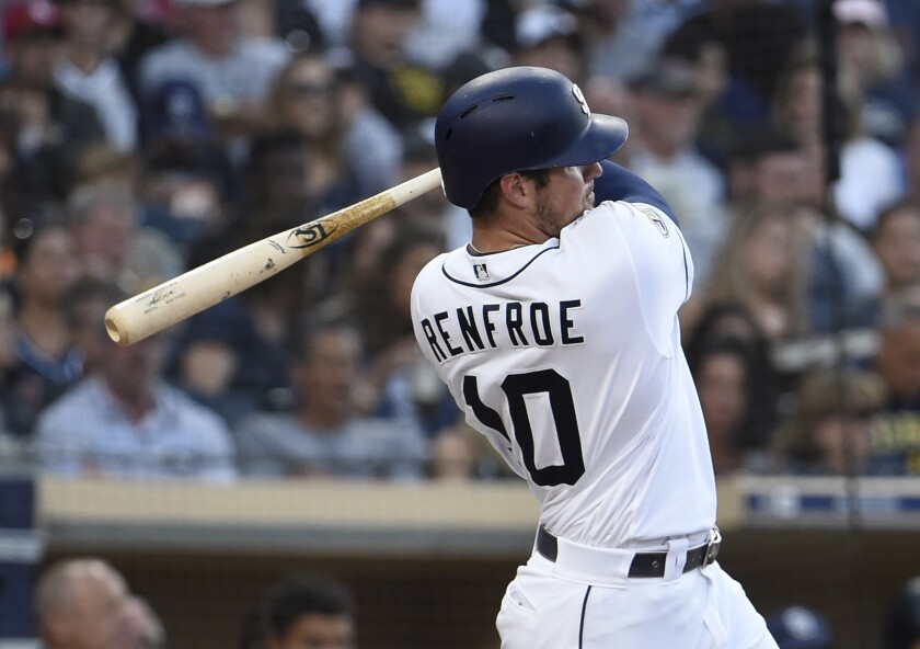 Hunter Renfroe hits an RBI double against the Colorado Rockies on Aug. 10.