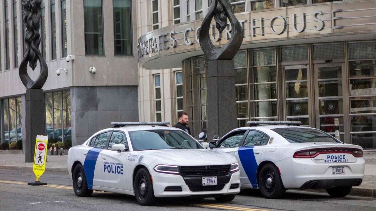 Police outside the courthouse in Brooklyn, N.Y., where Joaquin "El Chapo" Guzman is on trial.