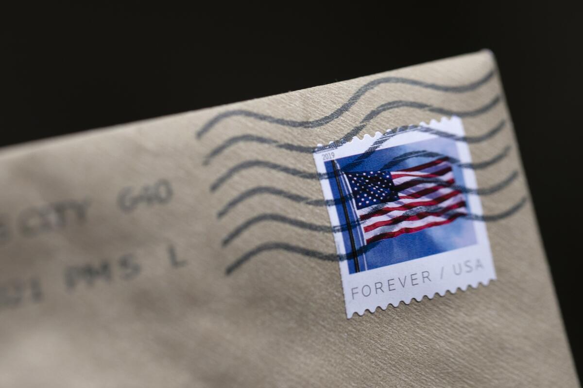 A stamp is shown on an envelope 