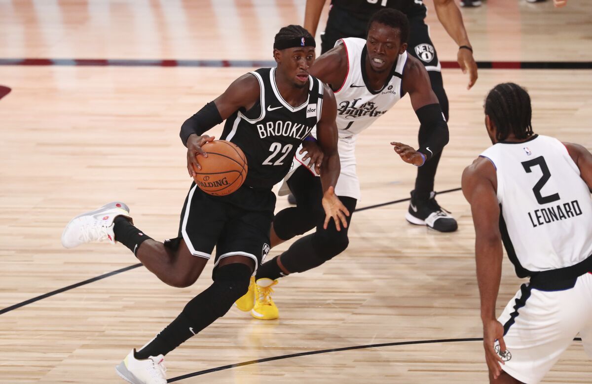 Brooklyn Nets guard Caris LeVert dribbles against the Clipppers.