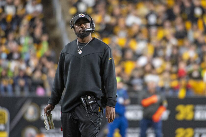 Pittsburgh Steelers coach Mike Tomlin looks up during a game against the Seattle Seahawks