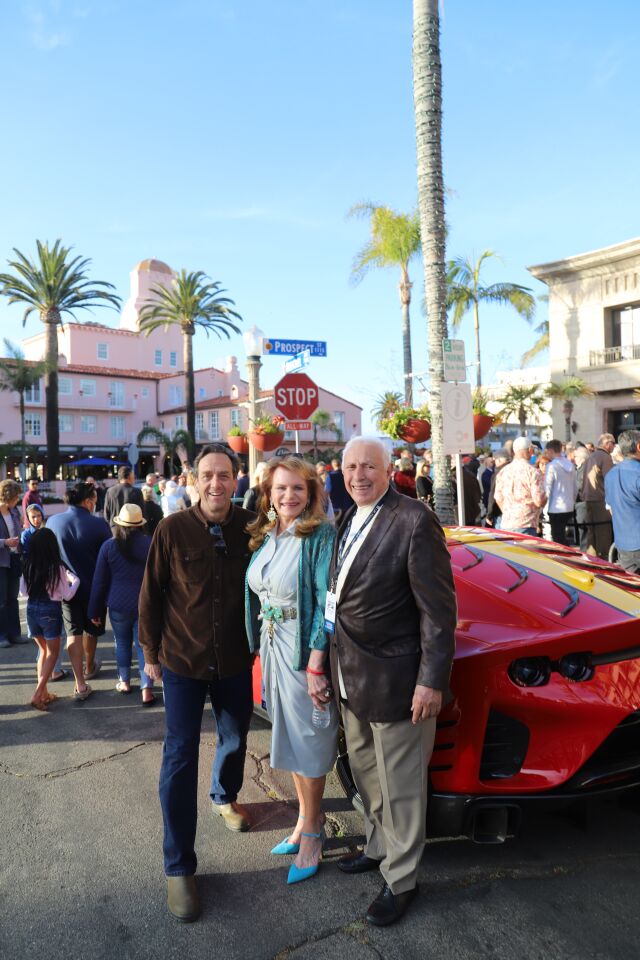 Shawn Styles and Peter and Judy Corrente turn out for "Ferrari Friday" at Prospect Street and Herschel Avenue in La Jolla.