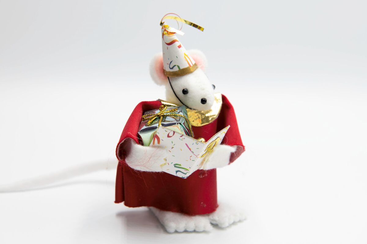 Every year, the Christmas Marketplace features a different Christmas mouse figurine about 4 inches tall and made of felt.