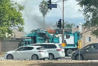 Los Angeles firefighters have evacuated about a dozen homes in Sun Valley as a precaution after a sanitation truck powered by compressed natural gas caught fire Monday afternoon.