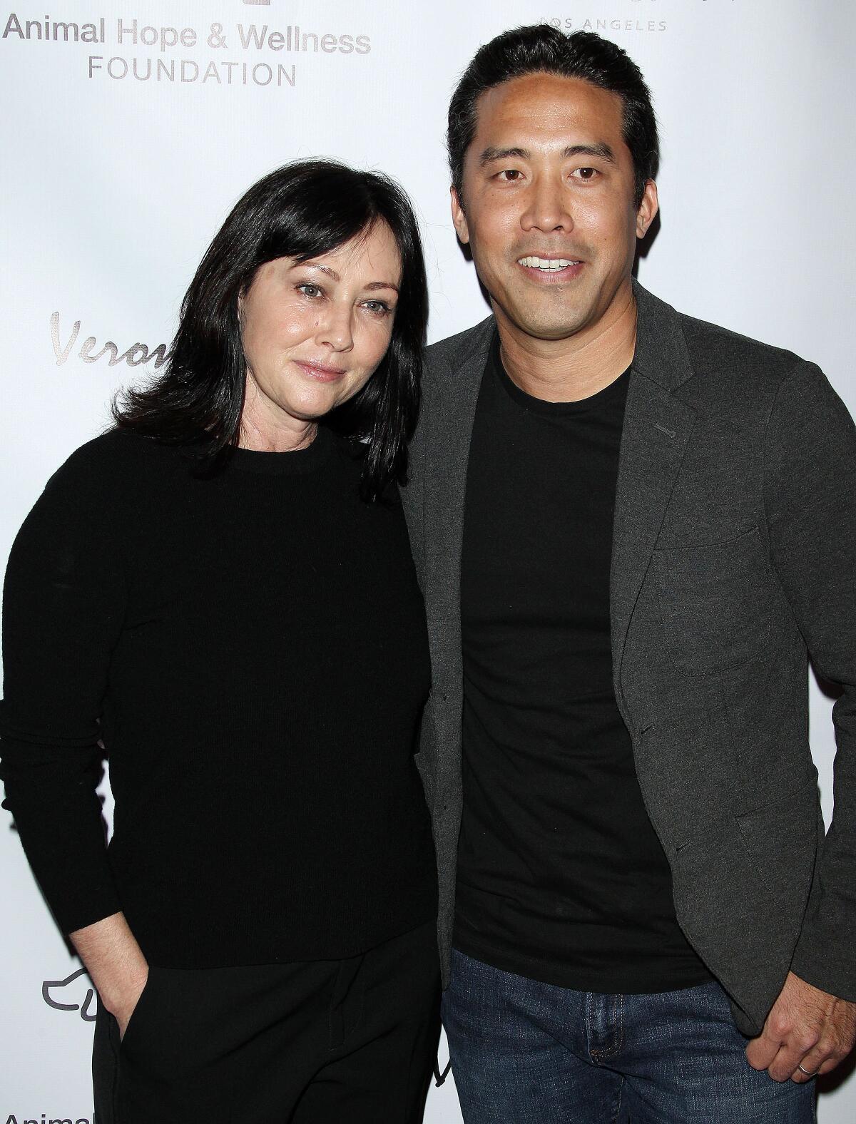 Animal activist Marc Ching at an event with actress Shannen Doherty in 2019.