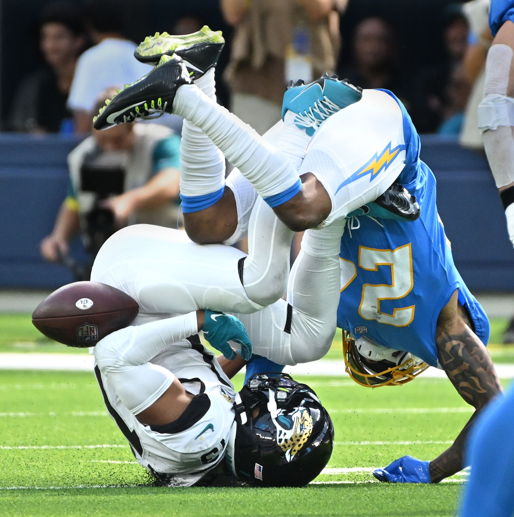Chargers safety Nasir Adderley, top, breaks up a pass intended for Jaguars receiver Christian Kirk in the third quarter.