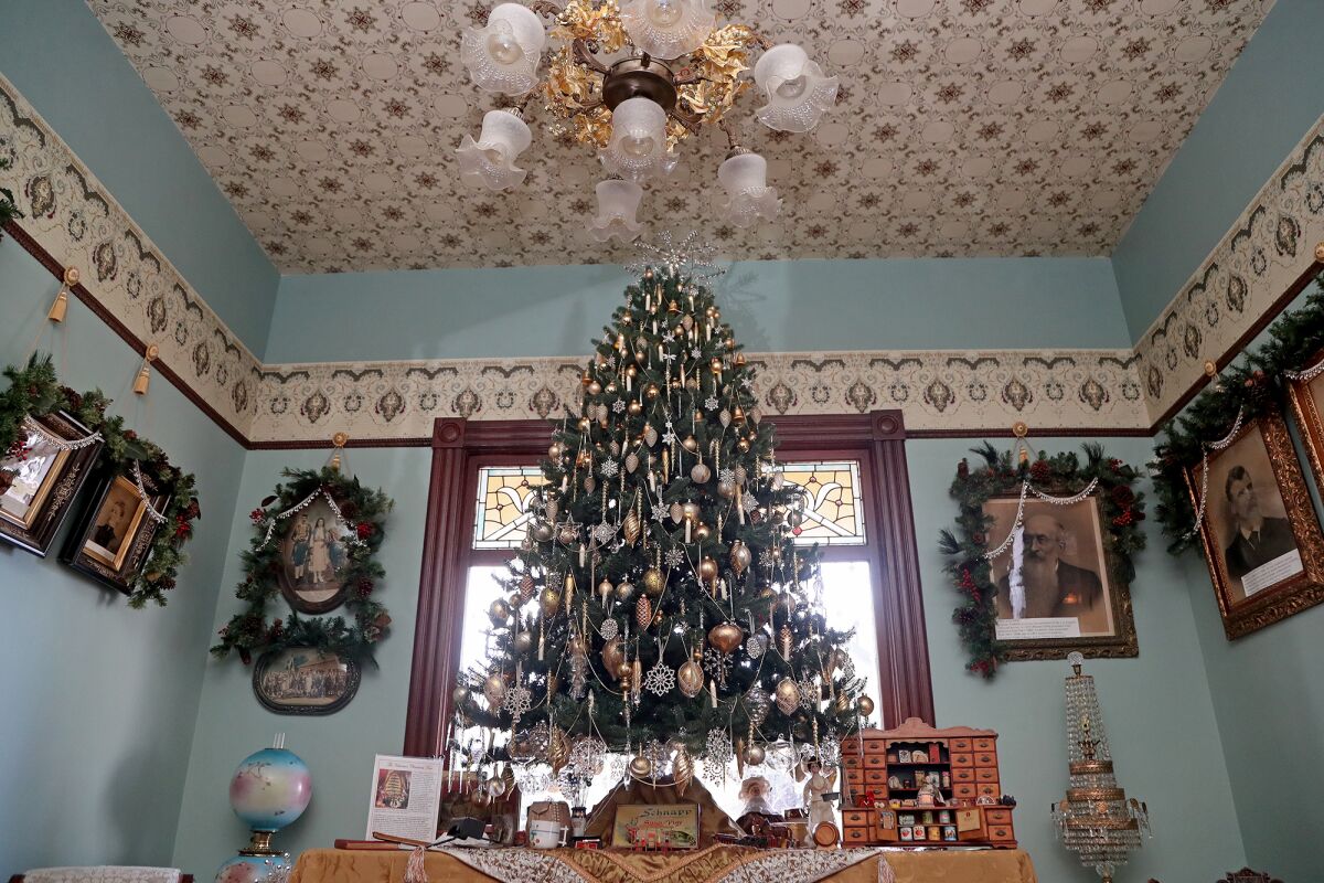 A Christmas tree inside the Woelke-Stoffel House at Founders' Park in Anaheim.