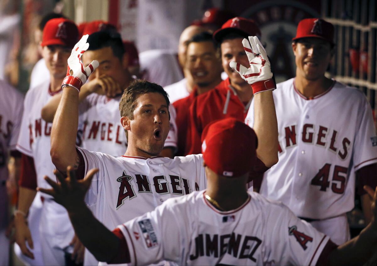 Angels' David Freese celebrates his home run against the Kansas City Royals during Game 1 of an American League division series on Oct. 2.