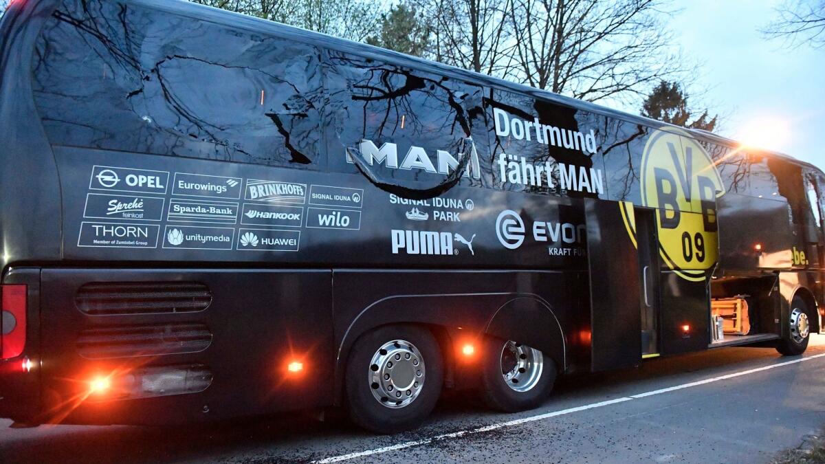 Explosions damaged a window of Dortmund's team bus April 11 in Dortmand, Germany. Two were injured.