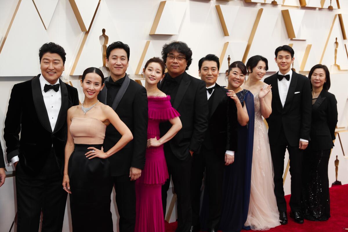The cast and crew of “Parasite,” from left, Kang-Ho Song, Cho Yeo Jeong, Lee Sun Kyun, Park So-dam, Bong Joon-ho, Park Myung-hoon, Lee Jeong-eun, Jang Hye-jin, Choi Woo-shik and Kwak Sin-ae.