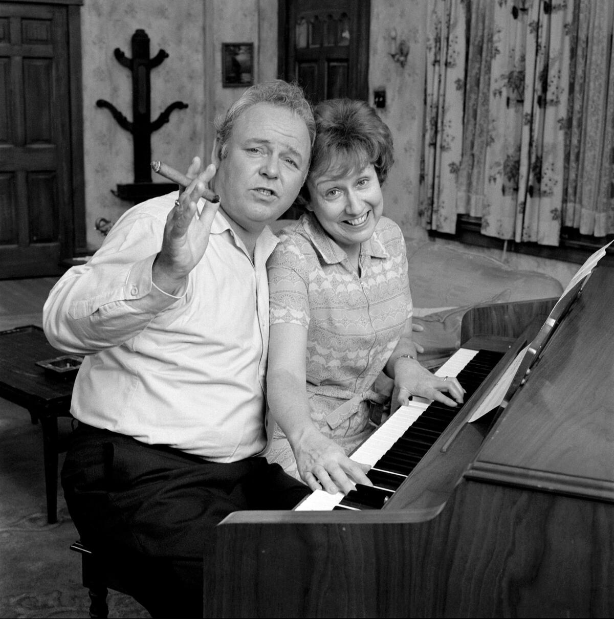 Carroll O'Connor, left, and Jean Stapleton in 1972 on the set of "All in the Family."