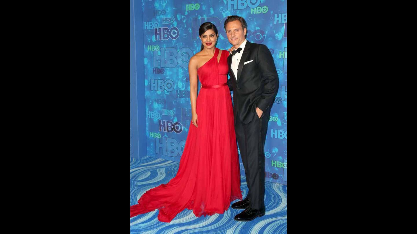 Actors Priyanka Chopra, left, and Tony Goldwyn attend HBO's Emmys after-party.