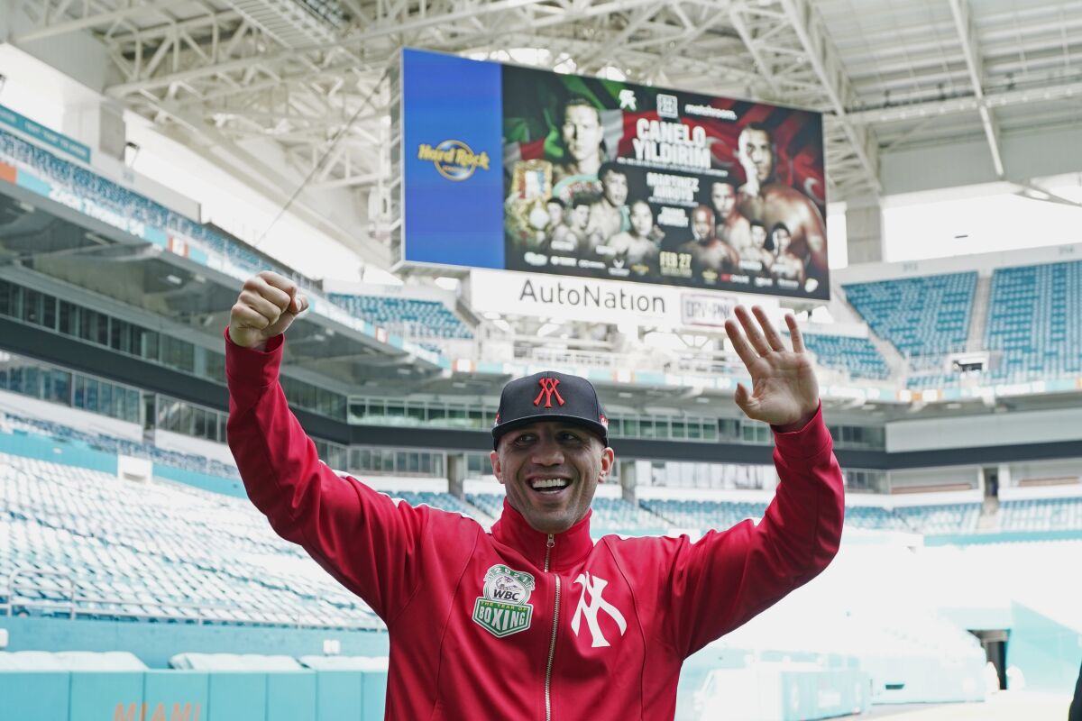 Boxer Avni Yildirim gestures during a photo shoot at Hard Rock Stadium in Miami Gardens, Fla., on Monday.
