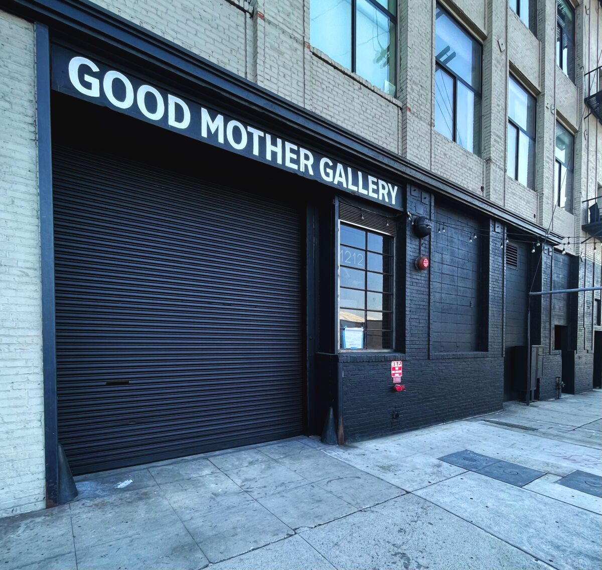 The building's exterior is titled Good Mother Gallery