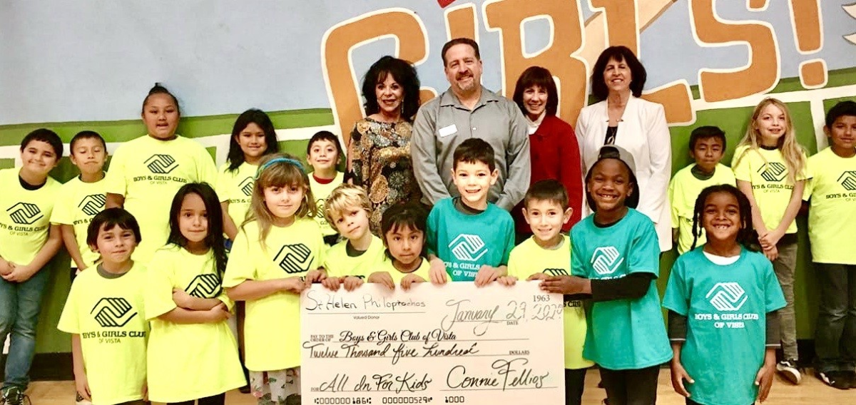 Adults (l-r): Katherine Foster, event chair, Matt Koumaras, Boys & Girls Club of Vista CEO, Connie Fellios, Saint Helen Philoptochos president, Angel Delagrammaticas, Saint Helen Philoptochos treasurer with some of the youth of the Boys & Girls Club of Vista.
