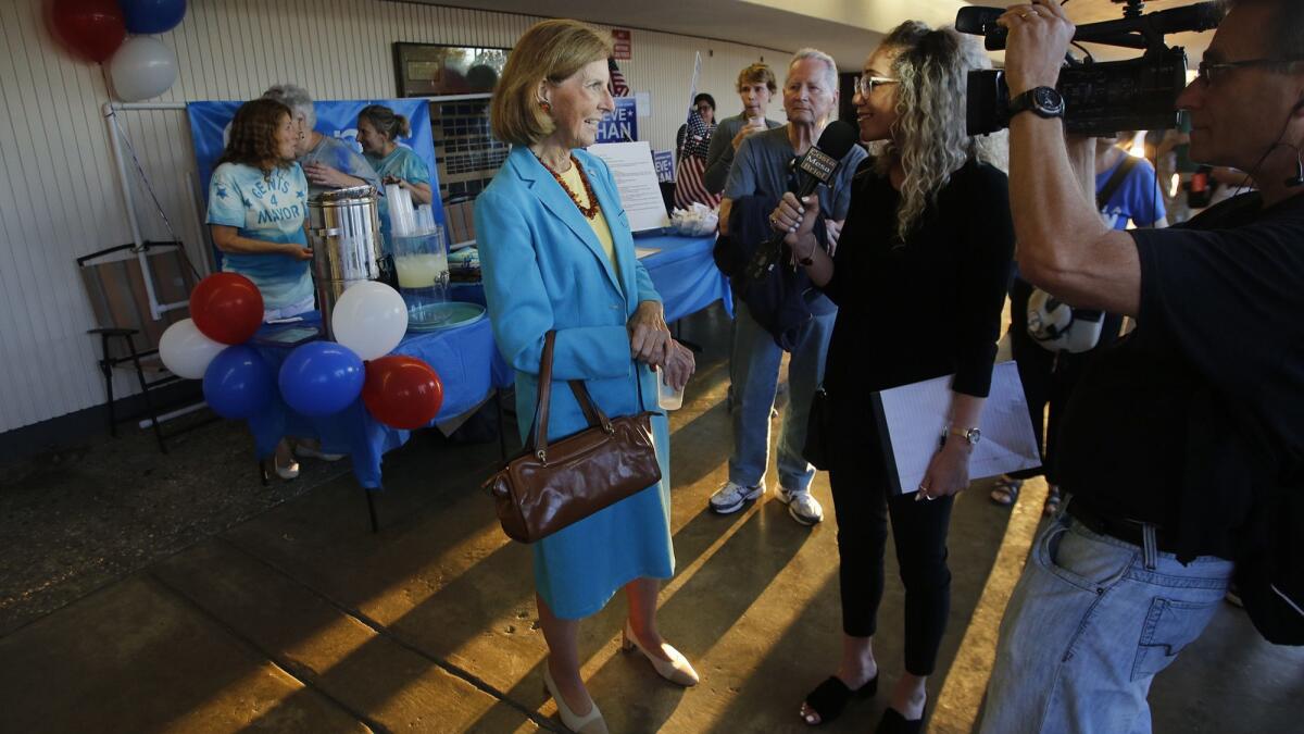 Costa Mesa mayoral candidate Sandy Genis is interviewed during the meet and greet before the 2018 Feet to the Fire candidates forum in the Robert Moore theater at Orange Coast College.