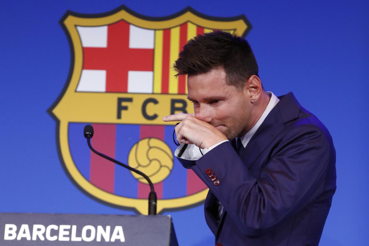Lionel Messi arrives to give a press conference at the Camp Nou stadium in Barcelona, Spain, Sunday, 