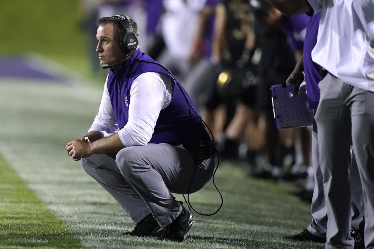 Northwestern coach Pat Fitzgerald watches during the second half of the team's NCAA college football game against Michigan State in Evanston, Ill., Friday, Sept. 3, 2021. Michigan State won 38-21. (AP Photo/Nam Y. Huh)