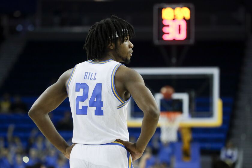 UCLA forward Jalen Hill watches during the first half of an NCAA college basketball game against Stanford in Los Angeles, Wednesday, Jan. 15, 2020. (AP Photo/Chris Carlson)