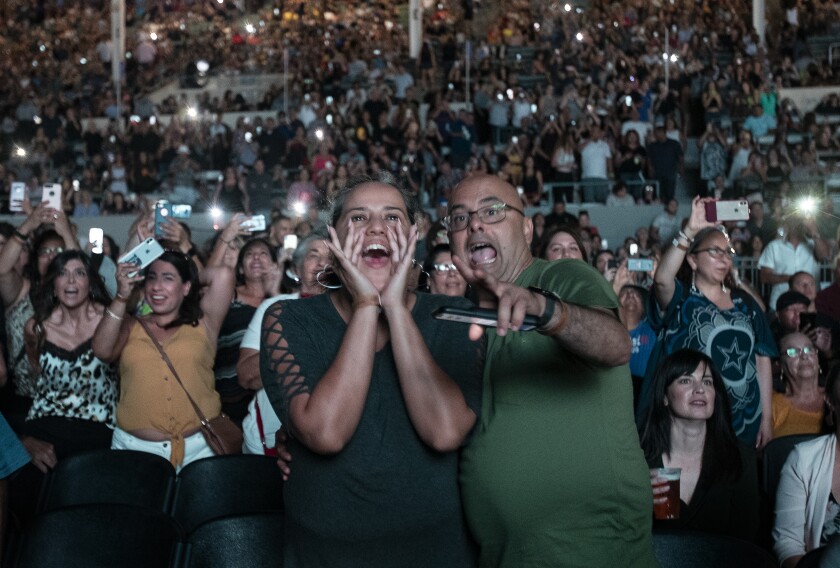 Fans react to a performance by Latin Grammy winner Pitbull at the L.A. County Fair earlier this month.