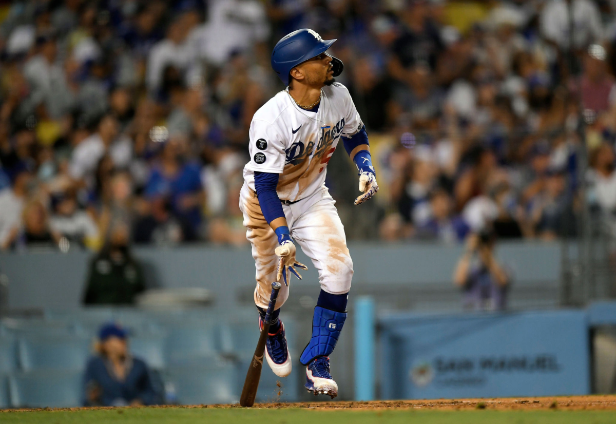 Mookie Betts hits a three-run home run in the fifth inning for the Dodgers.