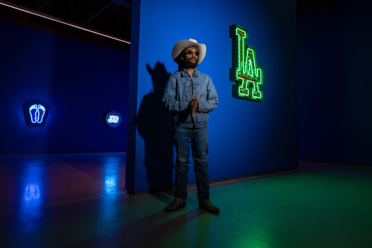 Los Angeles, CA - May 20: Artist Awol Erizku poses for a portrait at Sean Kelly gallery. (Jason Armond / Los Angeles Times)