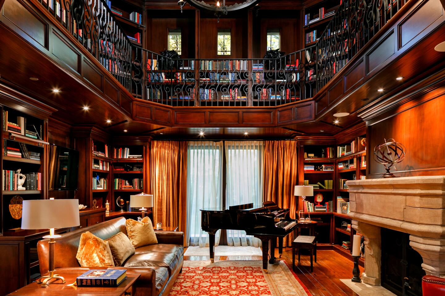 A two-story library is among the features of the 9,659-square-foot home.