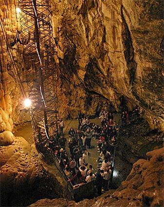 Deep under the wooded hills of Calaveras County lies one of the state's largest caves -- Moaning Cavern. There are two ways in -- the circular staircase or a 165-foot free-hanging rappel -- to a chamber big enough to hold the Statue of Liberty.