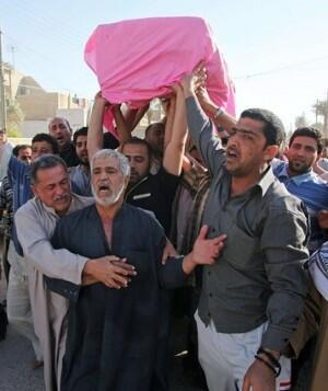 Mourners carry one of the victims in Baghdad. Overall, attacks have fallen by 90% since mid-2007.